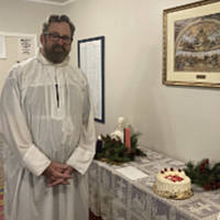 Father Bill with a Birthday Cake